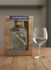 Bottle of Elephant Gin in a decorative box with branding and design elements.