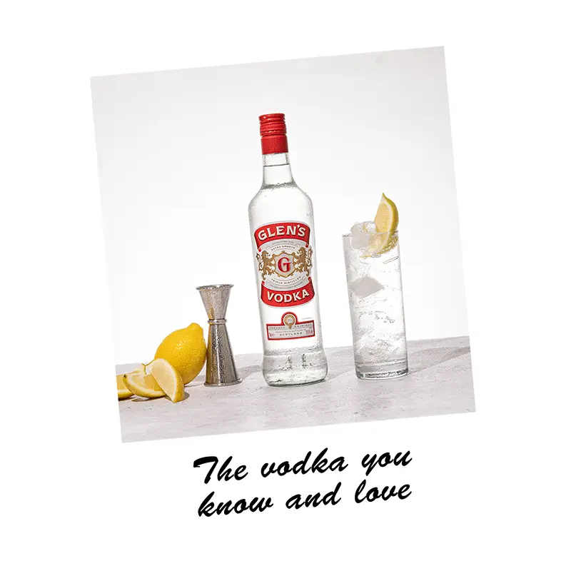 Glen's Vodka bottle with a glass of ice and lemon on a white background