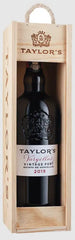 Taylor's vintage port wine bottle in a wooden box