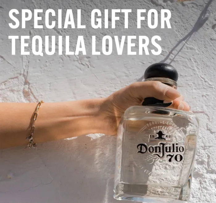 Hand holding a bottle of Don Julio tequila with text 'Special Gift for Tequila Lovers' on a textured surface.