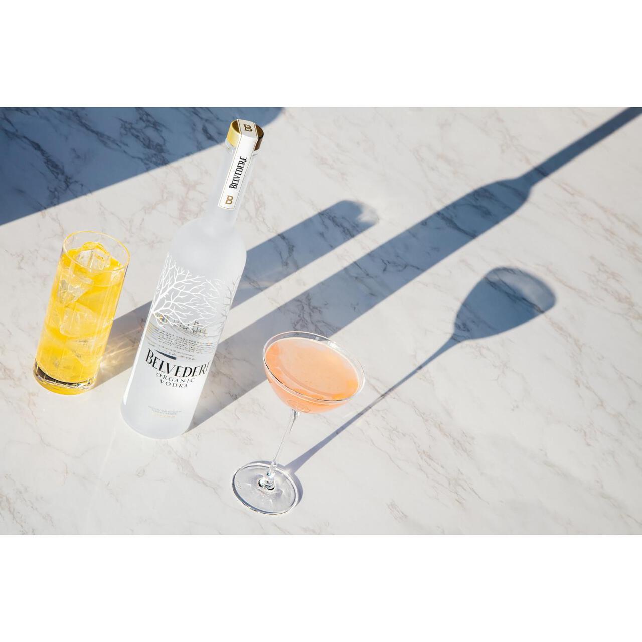 Bottle of Belvedere Vodka with two cocktails on a marble surface