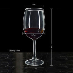 Wine glass with red wine, measurements, and capacity details on a black background