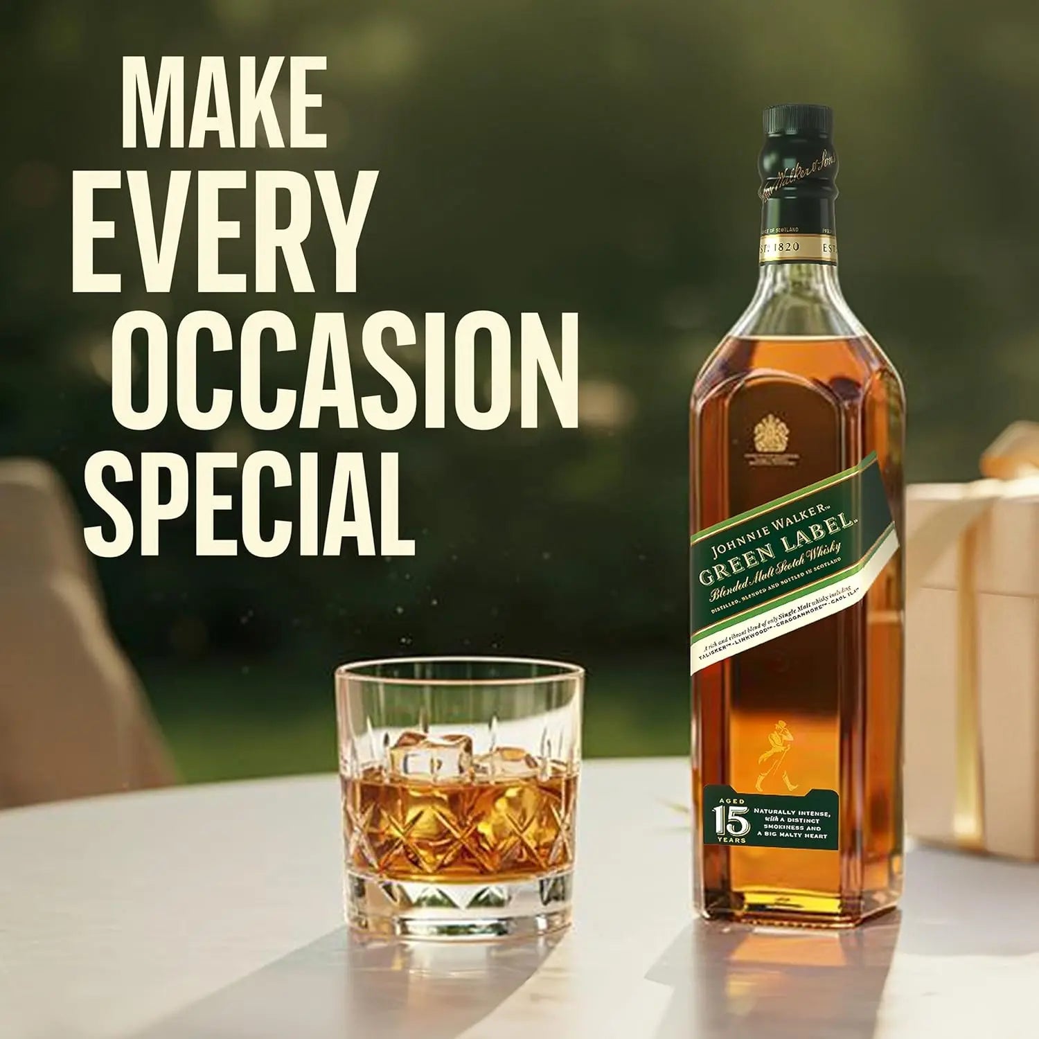 Johnnie Walker Green Label whisky bottle with a glass of whisky on a table, text 'Make Every Occasion Special'.