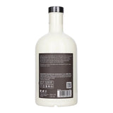 White bottle with a label on a white background